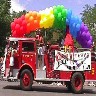 http://www.stonewallsociety.com\images\Pics Denver Pride\Wet & Wild Swim Team Firetruck.jpg (48039 bytes)